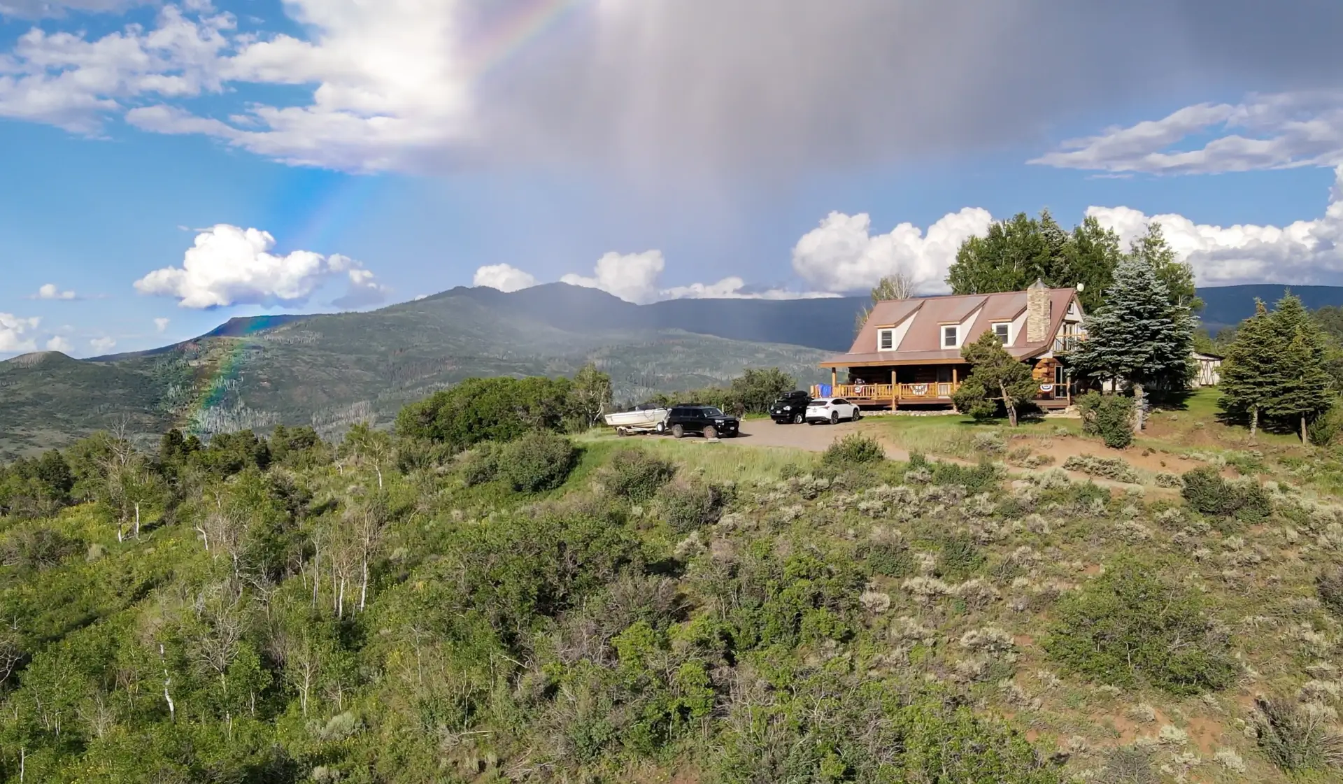 Cabin with Flat Tops Wilderness area in the background